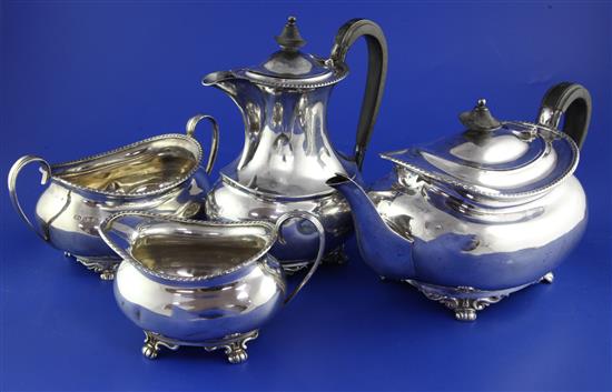 An Edwardian four piece silver tea set, gross 48.5 oz.